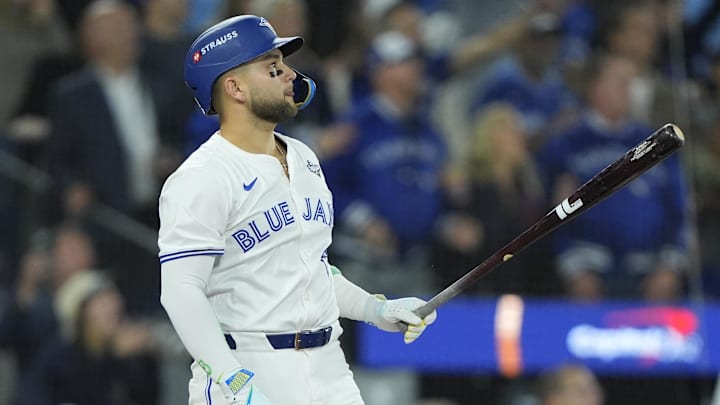 Nov 1, 2025; Toronto, Ontario, CAN; Toronto Blue Jays designated hitter Bo Bichette (11) hits a three run home run against the Los Angeles Dodgers in the third inning during game seven of the 2025 MLB World Series at Rogers Centre. Mandatory Credit: John E. Sokolowski-Imagn Images