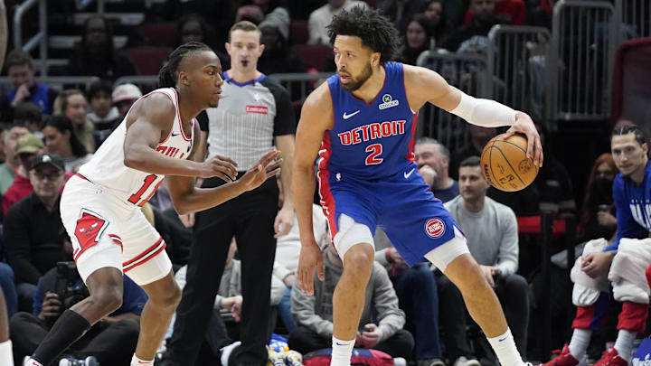 Feb 11, 2025; Chicago, Illinois, USA; Chicago Bulls guard Ayo Dosunmu (11) defends Detroit Pistons guard Cade Cunningham (2) during the first quarter at United Center. Mandatory Credit: David Banks-Imagn Images
