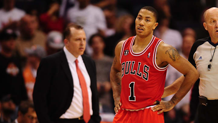 Nov. 24, 2010; Phoenix, AZ, USA; Chicago Bulls guard (1) Derrick Rose and head coach Tom Thibodeau against the Phoenix Suns at the US Airways Center. The Bulls defeated the Suns 123-115 in double overtime. Mandatory Credit: Mark J. Rebilas-Imagn Images