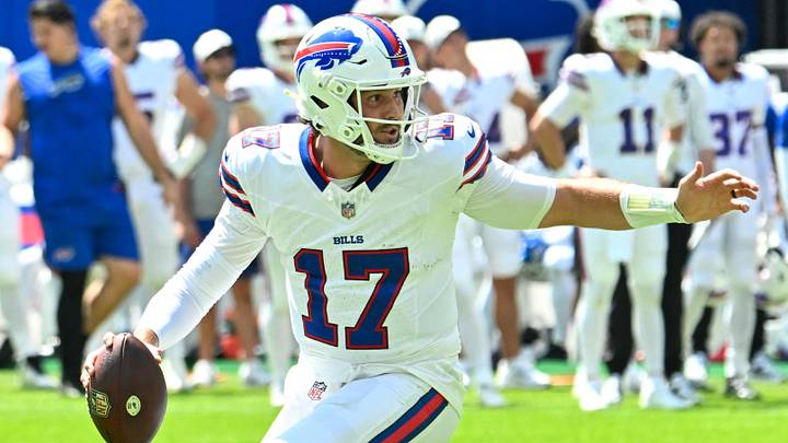 Aug 15, 2026; Orchard Park, New York, USA; Buffalo Bills quarterback Josh Allen (17) moves out of the pocket against the Carolina Panthers in the first quarter at the New Highmark Stadium. 