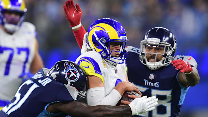 Nov 7, 2021; Inglewood, California, USA; Tennessee Titans outside linebacker Harold Landry (58) and linebacker David Long (51) move in against Los Angeles Rams quarterback Matthew Stafford (9) during the first half at SoFi Stadium. Mandatory Credit: Gary A. Vasquez-Imagn Images