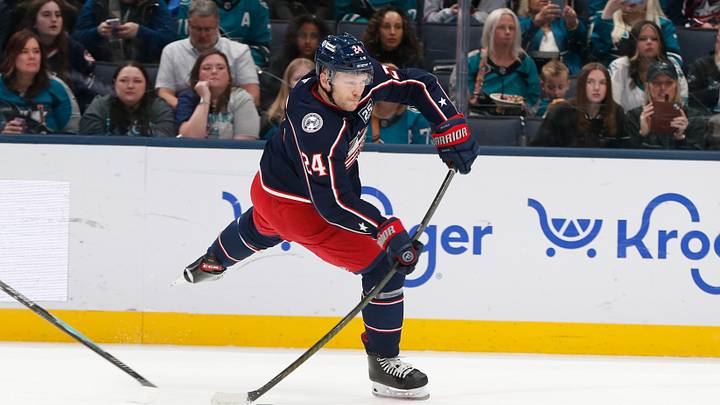 Mar 28, 2026; Columbus, Ohio, USA; Columbus Blue Jackets center Mathieu Olivier (24) wrists a shot on goal against the San Jose Sharks during the first period at Nationwide Arena. Mandatory Credit: Russell LaBounty-Imagn Images