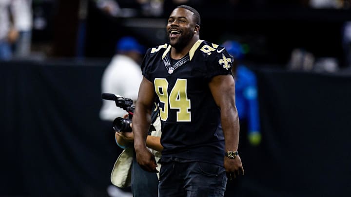 Sep 22, 2024; New Orleans, Louisiana, USA; Former New Orleans Saints running back Mark Ingram pumps up the fans during the first half against the Philadelphia Eagles at Caesars Superdome. Mandatory Credit: Stephen Lew-Imagn Images