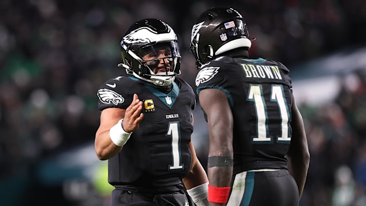 Nov 28, 2025; Philadelphia, Pennsylvania, USA; Philadelphia Eagles quarterback Jalen Hurts (1) and wide receiver A.J. Brown (11) celebrate their touchdown connection against the Chicago Bears at Lincoln Financial Field. Mandatory Credit: Bill Streicher-Imagn Images