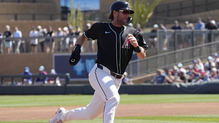 Arizona Diamondbacks third baseman Grae Kessinger (16) rounds third base before scoring against the Texas Rangers during Cactus League play at Salt River Fields on March 9, 2025.