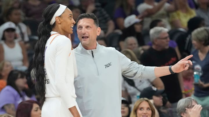 Phoenix Mercury head coach Nate Tibbetts talks to forward DeWanna Bonner (14) during the fourth quarter against the Connecticut Sun in Phoenix, at PHX Arena on Aug 5, 2025.