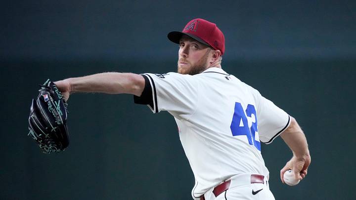 Arizona Diamondbacks starting pitcher Merrill Kelly throws against the Chicago Cubs during the first