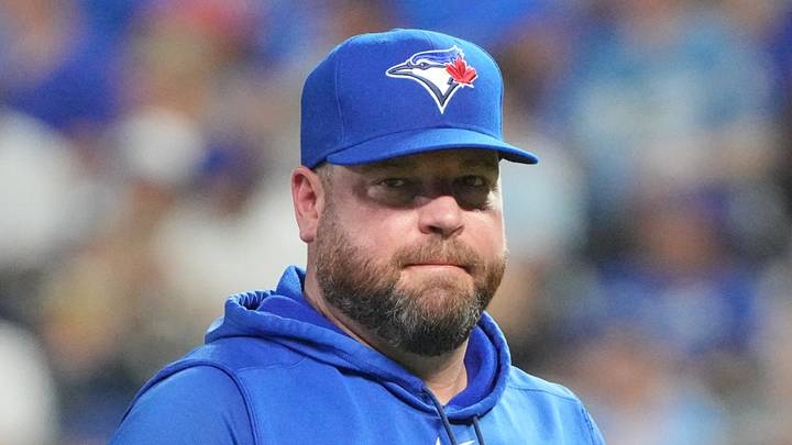 John Schneider will have lots of questions about his late-inning strategy in September 14's game. Mandatory Credit: Denny Medley-Imagn Images