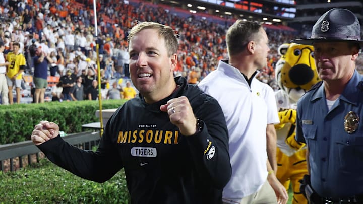 Missouri Tigers head coach Eli Drinkwitz celebrates after his team beat the Auburn Tigers in overtime at Jordan-Hare Stadium. Missouri Tigers head coach Eli Drinkwitz celebrates after his team beat the Auburn Tigers in overtime at Jordan-Hare Stadium.