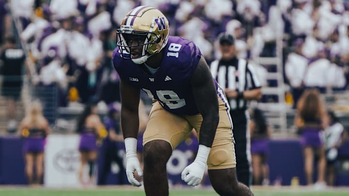 Jayden Wayne sets himself to pass rush against Eastern Michigan. Jayden Wayne sets himself to pass rush against Eastern Michigan.