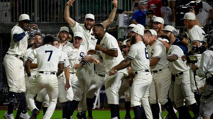 The Chicago White Sox’s Tim Anderson (7) hits a two-run walk-off home run in the bottom of the ninth inning to give the White Sox a 9-8 victory over the New York Yankees at the Field of Dreams movie site on Thursday, Aug. 12, 2021 in Dyersville, Iowa. The Chicago White Sox’s Tim Anderson (7) hits a two-run walk-off home run in the bottom of the ninth inning to give the White Sox a 9-8 victory over the New York Yankees at the Field of Dreams movie site on Thursday, Aug. 12, 2021 in Dyersville, Iowa.