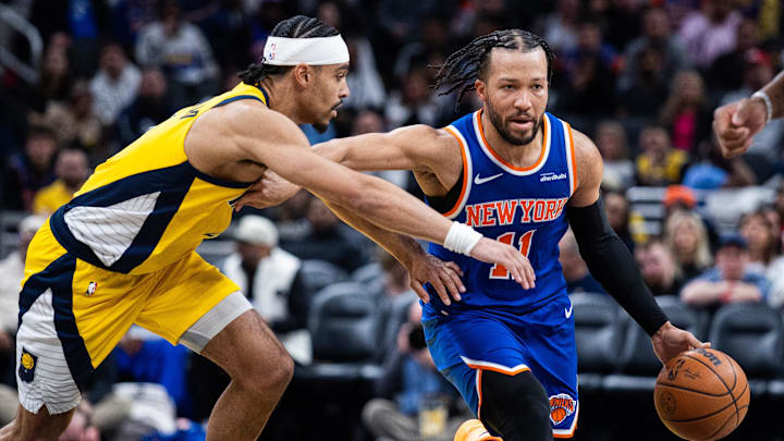 Mar 13, 2026; Indianapolis, Indiana, USA;  New York Knicks guard Jalen Brunson (11) dribbles the ball while Indiana Pacers guard/forward Andrew Nembhard (2) defends in the second half at Gainbridge Fieldhouse. Mandatory Credit: Trevor Ruszkowski-Imagn Images