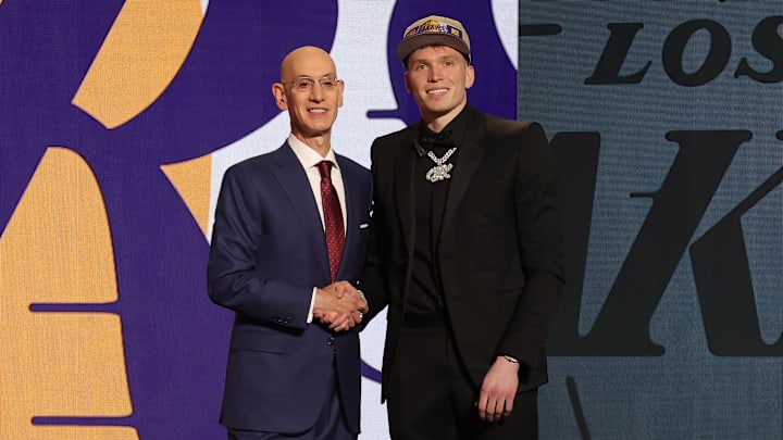 Jun 26, 2024; Brooklyn, NY, USA; Dalton Knecht poses for photos with NBA commissioner Adam Silver after being selected in the first round by the Los Angeles Lakers in the 2024 NBA Draft at Barclays Center. Mandatory Credit: Brad Penner-USA TODAY Sports Jun 26, 2024; Brooklyn, NY, USA; Dalton Knecht poses for photos with NBA commissioner Adam Silver after being selected in the first round by the Los Angeles Lakers in the 2024 NBA Draft at Barclays Center. Mandatory Credit: Brad Penner-USA TODAY Sports