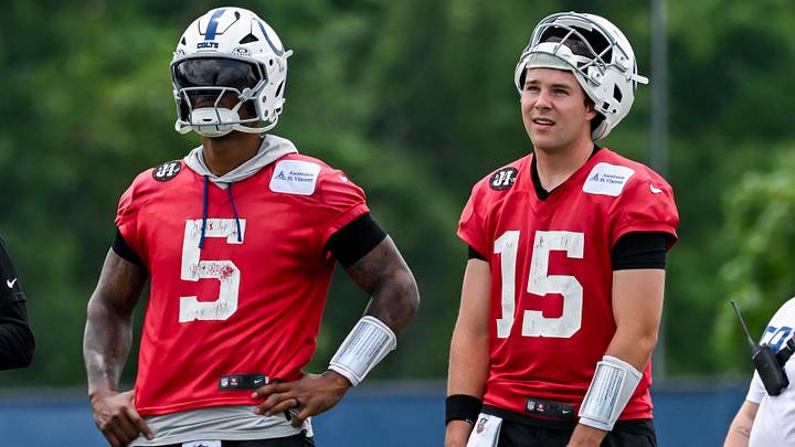 Jun 9, 2026; Indianapolis, IN, USA; Indianapolis Colts quarterback Anthony Richardson Sr. (5) and Indianapolis Colts quarterback Riley Leonard (15) look on during minicamp at Indiana Farm Bureau Football Center. Mandatory Credit: Robert Goddin-Imagn Images