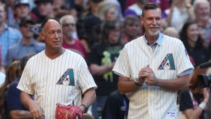 Former Arizona Diamondbacks outfielder Luis Gonzalez (left) and hall of fame member Randy Johnson before throwing out the ceremonial first pitch before game three of the 2023 World Series at Chase Field on Oct. 30, 2023, in Phoenix, Arizona. Former Arizona Diamondbacks outfielder Luis Gonzalez (left) and hall of fame member Randy Johnson before throwing out the ceremonial first pitch before game three of the 2023 World Series at Chase Field on Oct. 30, 2023, in Phoenix, Arizona.