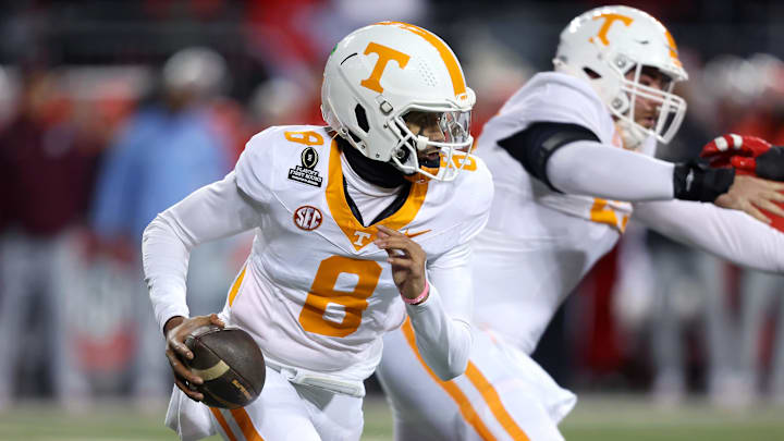 Dec 21, 2024; Columbus, Ohio, USA;  Tennessee Volunteers quarterback Nico Iamaleava (8) looks to pass during the first quarter against the Ohio State Buckeyes at Ohio Stadium. Mandatory Credit: Joseph Maiorana-Imagn Images
