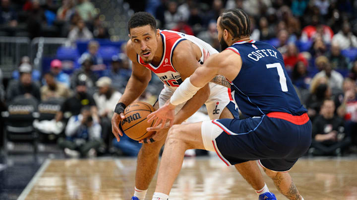 Nov 27, 2024; Washington, District of Columbia, USA; Washington Wizards guard Malcolm Brogdon (15) controls the ball against LA Clippers guard Amir Coffey (7) during the first quarter at Capital One Arena. Mandatory Credit: Reggie Hildred-Imagn Images Nov 27, 2024; Washington, District of Columbia, USA; Washington Wizards guard Malcolm Brogdon (15) controls the ball against LA Clippers guard Amir Coffey (7) during the first quarter at Capital One Arena. Mandatory Credit: Reggie Hildred-Imagn Images
