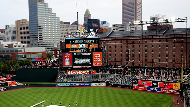 Sep 23, 2025; Baltimore, Maryland, USA; A weather delay commences before a game between the Baltimore Orioles and Tampa Bay Rays at Oriole Park at Camden Yards. Mandatory Credit: Daniel Kucin Jr.-Imagn Images