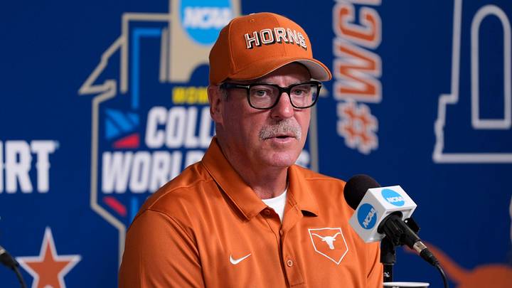 Texas Longhorns coach Mike White speaks during a press conference for the Women's College World Series.