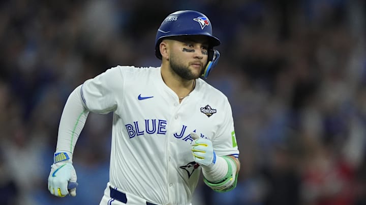 Nov 1, 2025; Toronto, Ontario, CAN; Toronto Blue Jays designated hitter Bo Bichette (11) runs after hitting a three run home run against the Los Angeles Dodgers in the third inning during game seven of the 2025 MLB World Series at Rogers Centre. Nov 1, 2025; Toronto, Ontario, CAN; Toronto Blue Jays designated hitter Bo Bichette (11) runs after hitting a three run home run against the Los Angeles Dodgers in the third inning during game seven of the 2025 MLB World Series at Rogers Centre.
