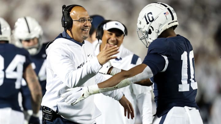 Penn State coach James Franklin celebrates with running back Nicholas Singleton during a Nittany Lions game at Beaver Stadium. Penn State coach James Franklin celebrates with running back Nicholas Singleton during a Nittany Lions game at Beaver Stadium.