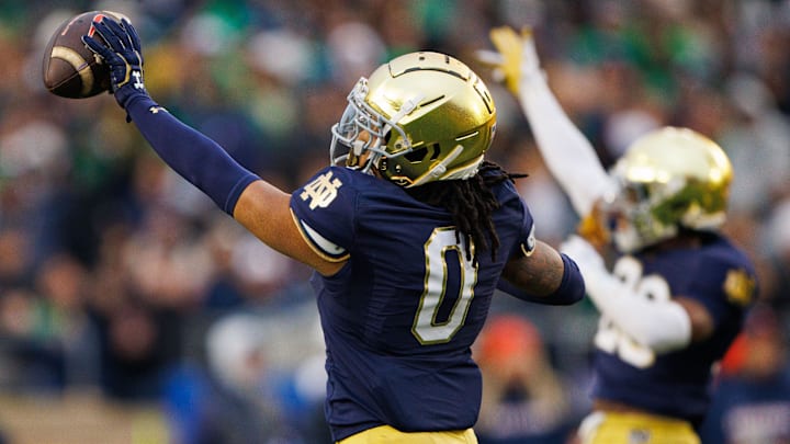 Notre Dame safety Xavier Watts (0) celebrates picking up a Virginia fumble during a NCAA college football game at Notre Dame Stadium on Saturday, Nov. 16, 2024, in South Bend. Notre Dame safety Xavier Watts (0) celebrates picking up a Virginia fumble during a NCAA college football game at Notre Dame Stadium on Saturday, Nov. 16, 2024, in South Bend.