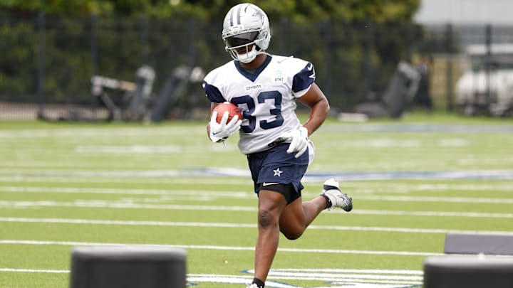 Dallas Cowboys RB Javonte Williams goes through a drill during practice at the Ford Center at the Star Training Facility.