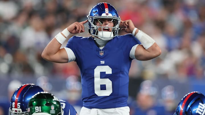 Aug 16, 2025; East Rutherford, New Jersey, USA; New York Giants quarterback Jaxson Dart (6) signals during the second half against the New York Jets at MetLife Stadium. Mandatory Credit: Vincent Carchietta-Imagn Images