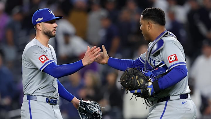 Oct 7, 2024; Bronx, New York, USA; Kansas City Royals pitcher Lucas Erceg (60) reacts with catcher Salvador Perez (13) after the final out in game two of the ALDS against the New York Yankees for the 2024 MLB Playoffs at Yankee Stadium. Mandatory Credit: Brad Penner-Imagn Images