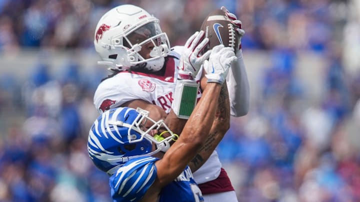 Memphis' Marcello Bussey (6) has the ball pulled out of his hands by Arkansas' Julian Neal (23) during the game between Memphis and Arkansas at Simmons Bank Liberty Stadium in Memphis, Tenn., on September 20, 2025.