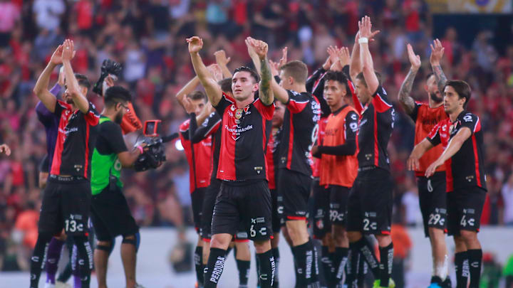 Jugadores del Atlas celebran un triunfo.