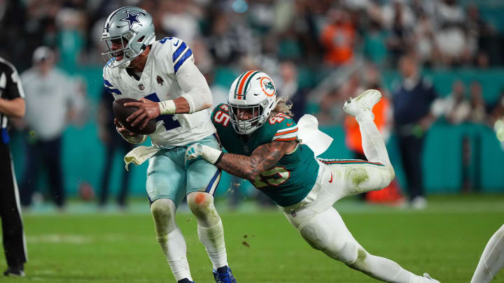 Dec 24, 2023; Miami Gardens, Florida, USA; Miami Dolphins linebacker Duke Riley (45) pressures Dallas Cowboys quarterback Dak Prescott (4) during the second half at Hard Rock Stadium.