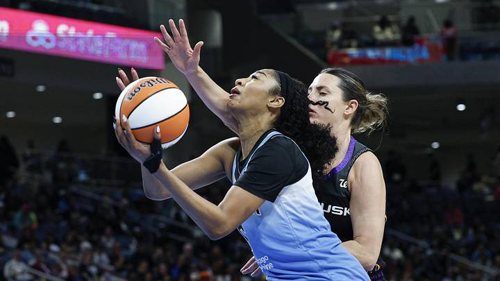 Sep 3, 2025; Chicago, Illinois, USA; Chicago Sky forward Angel Reese (5) drives to the basket against the Connecticut Sun during the second half at Wintrust Arena. Mandatory Credit: Kamil Krzaczynski-Imagn Images