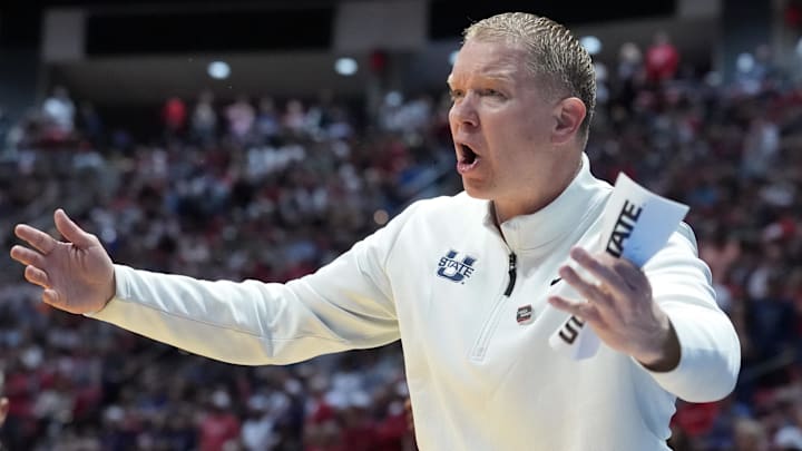 Mar 22, 2026; San Diego, CA, USA; Utah State Aggies head coach Jerrod Calhoun reacts in the first half against the Arizona Wildcats during a second round game of the men's 2026 NCAA Tournament at Viejas Arena. Mandatory Credit: Kirby Lee-Imagn Images