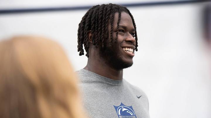 Offensive tackle Olu Fashanu laughs as he talks with reporters during Penn State's Pro Day in Holuba Offensive tackle Olu Fashanu laughs as he talks with reporters during Penn State's Pro Day in Holuba