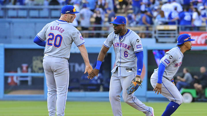Oct 14, 2024; Los Angeles, California, USA; New York Mets first baseman Pete Alonso (20) and outfielder Starling Marte (6) celebrate after defeating the Los Angeles Dodgers in game two of the NLCS for the 2024 MLB Playoffs at Dodger Stadium. Mandatory Credit: Jayne Kamin-Oncea-Imagn Images Oct 14, 2024; Los Angeles, California, USA; New York Mets first baseman Pete Alonso (20) and outfielder Starling Marte (6) celebrate after defeating the Los Angeles Dodgers in game two of the NLCS for the 2024 MLB Playoffs at Dodger Stadium. Mandatory Credit: Jayne Kamin-Oncea-Imagn Images