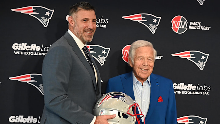 Jan 13, 2025; Foxborough, MA, USA; Mike Vrabel (left) poses for a photo with New England Patriots owner Robert Kraft (right) after a press conference at Gillette Stadium to introduce him as the Patriots new head coach. Mandatory Credit: Eric Canha-Imagn Images