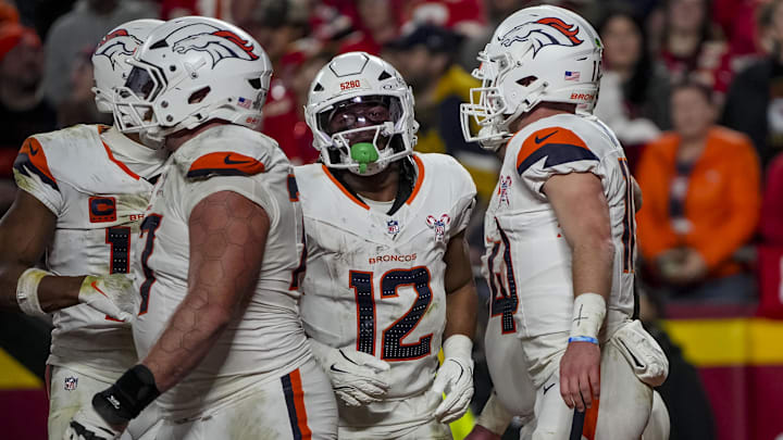 Dec 25, 2025; Kansas City, Missouri, USA; Denver Broncos quarterback Bo Nix (10) celebrates after scoring during the third quarter at GEHA Field at Arrowhead Stadium.