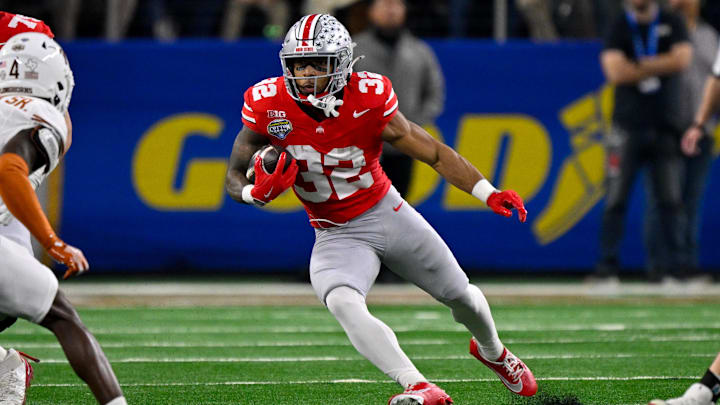Jan 10, 2025; Arlington, TX, USA; Ohio State Buckeyes running back TreVeyon Henderson (32) in action during the game between the Texas Longhorns and the Ohio State Buckeyes at AT&T Stadium. 
