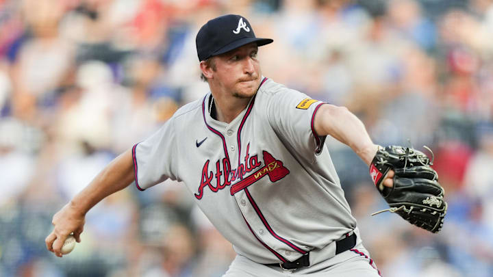 Jul 29, 2025; Kansas City, Missouri, USA; Atlanta Braves starting pitcher Erick Fedde (22) pitches during the first inning against the Kansas City Royals at Kauffman Stadium. Mandatory Credit: Jay Biggerstaff-Imagn Images