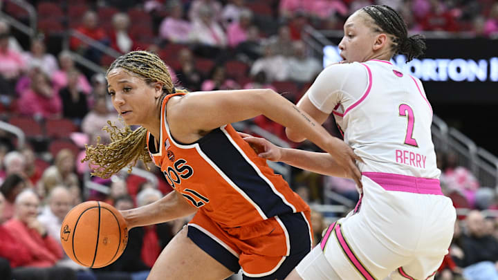 Virginia Cavaliers guard Kymora Johnson and Louisville Cardinals guard Imari Berry 