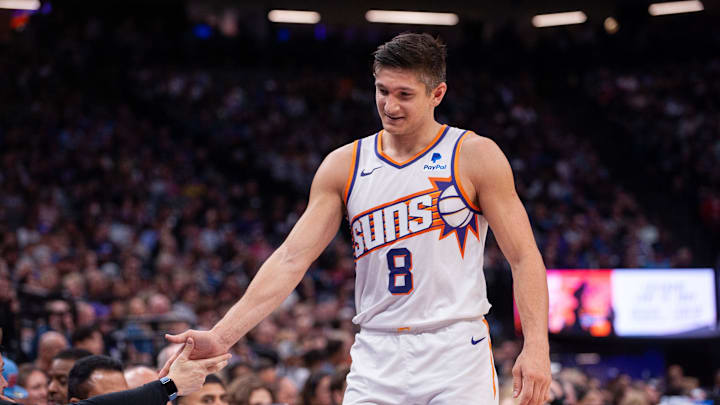 Apr 12, 2024; Sacramento, California, USA; Phoenix Suns guard Grayson Allen (8) high fives coaches