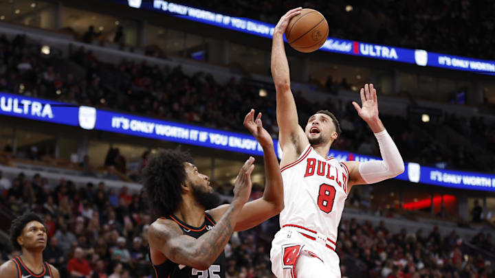 Nov 12, 2023; Chicago, Illinois, USA; Chicago Bulls guard Zach LaVine (8) goes to the basket against Detroit Pistons forward Marvin Bagley III (35) during the second half at United Center. Mandatory Credit: Kamil Krzaczynski-Imagn Images