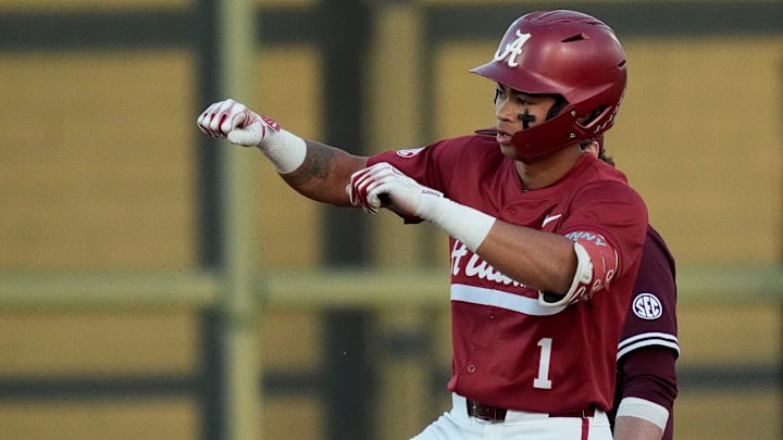 Alabama shortstop Justin Lebron (1) celebrates a double during the game with Mississippi State at Sewell-Thomas Stadium in Tuscaloosa Friday, April 11, 2025.