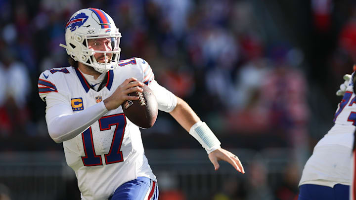 Dec 21, 2025; Cleveland, Ohio, USA;  Buffalo Bills quarterback Josh Allen (17) looks downfield against the Cleveland Browns during the first half at Huntington Bank Field. Mandatory Credit: Scott Galvin-Imagn Images