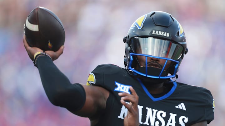 Kansas Jayhawks quarterback Jalon Daniels (6) throws a pass during the first half of the game against West Virginia Mountaineers at David Booth Kansas Memorial Stadium on Sept. 20, 2025.