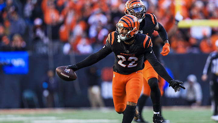 Dec 22, 2024; Cincinnati, Ohio, USA; Cincinnati Bengals safety Geno Stone (22) reacts after intercepting a pass against the Cleveland Browns in the second half at Paycor Stadium. Mandatory Credit: Katie Stratman-Imagn Images