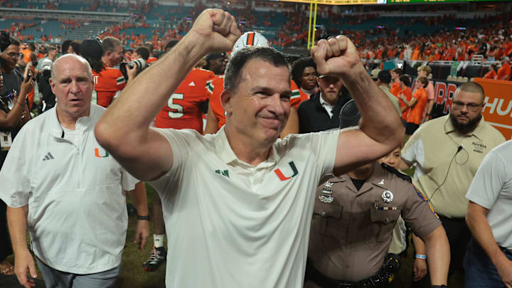 Aug 31, 2025; Miami Gardens, Florida, USA; Miami Hurricanes head coach Mario Cristobal reacts after defeating the Notre Dame Fighting Irish at Hard Rock Stadium. Aug 31, 2025; Miami Gardens, Florida, USA; Miami Hurricanes head coach Mario Cristobal reacts after defeating the Notre Dame Fighting Irish at Hard Rock Stadium.