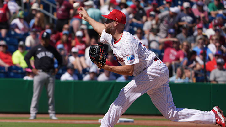 Feb 27, 2025; Clearwater, Florida, USA; Philadelphia Phillies pitcher Zack Wheeler (45) throws a pitch during the first inning against the New York Yankees at BayCare Ballpark. Feb 27, 2025; Clearwater, Florida, USA; Philadelphia Phillies pitcher Zack Wheeler (45) throws a pitch during the first inning against the New York Yankees at BayCare Ballpark.