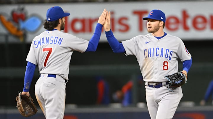 May 1, 2023; Washington, District of Columbia, USA; Chicago Cubs shortstop Dansby Swanson (7) and left fielder Ian Happ (8) celebrate after the game against the Washington Nationals.